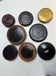 A collection of 70 Chinese wooden stands, 19/20th C.