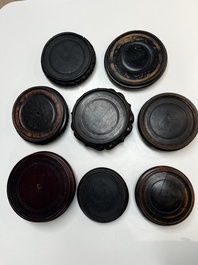 A collection of 75 Chinese wooden stands, 19/20th C.