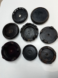 A collection of 75 Chinese wooden stands, 19/20th C.