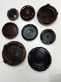 A collection of 75 Chinese wooden stands, 19/20th C.