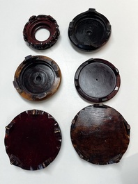 A collection of 75 Chinese wooden stands, 19/20th C.