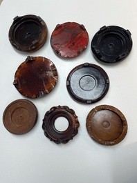 A collection of 75 Chinese wooden stands, 19/20th C.