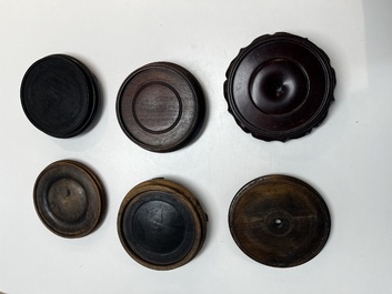 A collection of 75 Chinese wooden stands, 19/20th C.