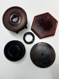 A collection of 70 Chinese wooden stands, 19/20th C.
