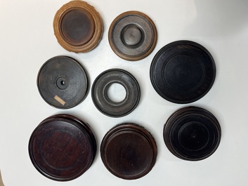 A collection of 75 Chinese wooden stands, 19/20th C.