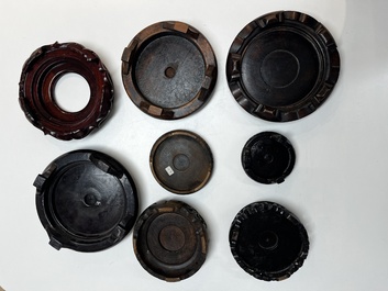 A collection of 75 Chinese wooden stands, 19/20th C.