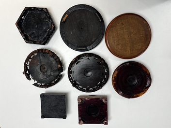 A collection of 70 Chinese wooden stands, 19/20th C.