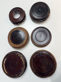 A collection of 75 Chinese wooden stands, 19/20th C.