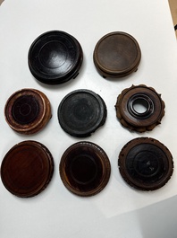 A collection of 75 Chinese wooden stands, 19/20th C.