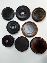 A collection of 70 Chinese wooden stands, 19/20th C.