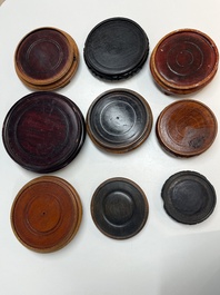 A collection of 75 Chinese wooden stands, 19/20th C.