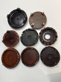 A collection of 75 Chinese wooden stands, 19/20th C.