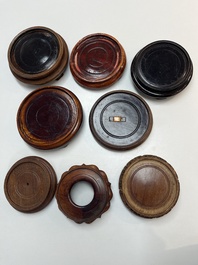 A collection of 75 Chinese wooden stands, 19/20th C.