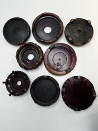 A collection of 70 Chinese wooden stands, 19/20th C.