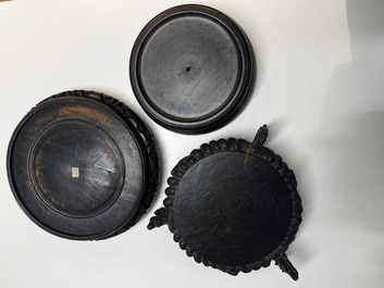 A collection of 40 mainly Chinese wooden stands, 19/20th C.