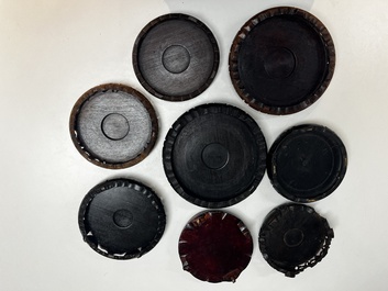 A collection of 80 Chinese wooden stands, 19/20th C.