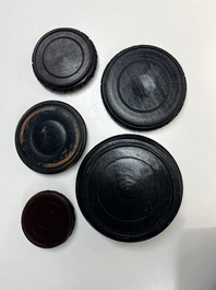A collection of 80 Chinese wooden stands, 19/20th C.