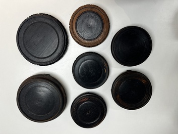 A collection of 80 Chinese wooden stands, 19/20th C.