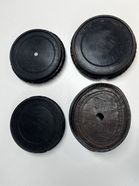 A collection of 40 mainly Chinese wooden stands, 19/20th C.
