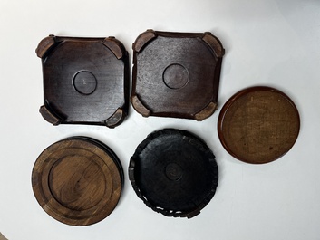 A collection of 40 mainly Chinese wooden stands, 19/20th C.