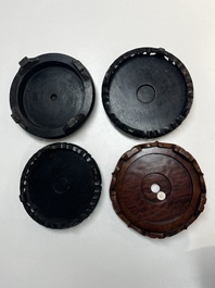 A collection of 40 mainly Chinese wooden stands, 19/20th C.