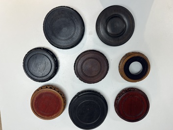 A collection of 80 Chinese wooden stands, 19/20th C.