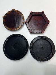 A collection of 40 mainly Chinese wooden stands, 19/20th C.