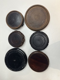 A collection of 80 Chinese wooden stands, 19/20th C.