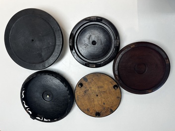 A collection of 40 mainly Chinese wooden stands, 19/20th C.