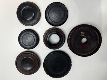 A collection of 80 Chinese wooden stands, 19/20th C.