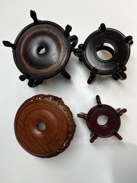 A collection of 40 mainly Chinese wooden stands, 19/20th C.