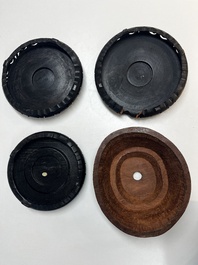 A collection of 40 mainly Chinese wooden stands, 19/20th C.