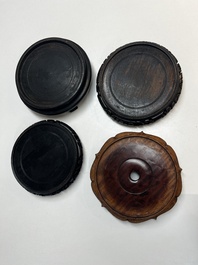 A collection of 40 mainly Chinese wooden stands, 19/20th C.