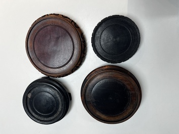 A collection of 80 Chinese wooden stands, 19/20th C.