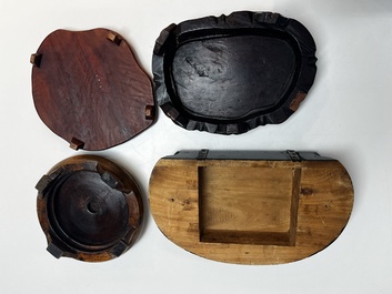 A collection of 40 mainly Chinese wooden stands, 19/20th C.