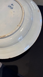 A pair of fine large blue and white Dutch Delft biblical subject dishes, dated 1781