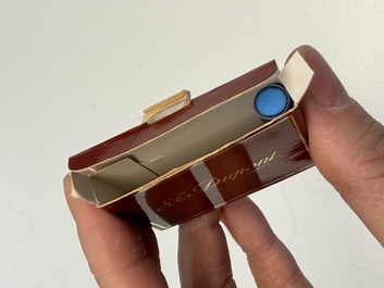 A gold-plated twist ballpoint pen and a fountain pen with an 18kt gold nib, S.T. Dupont Paris, France, 20th C.