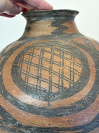 A Chinese painted pottery jar with geometric design, Neolithic period, Majiayao culture, 3rd millennium B.C.