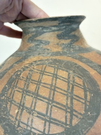 A Chinese painted pottery jar with geometric design, Neolithic period, Majiayao culture, 3rd millennium B.C.