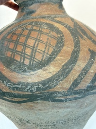 A Chinese painted pottery jar with geometric design, Neolithic period, Majiayao culture, 3rd millennium B.C.