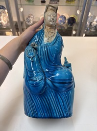 A Chinese turquoise-glazed Guanyin, a white-glazed bottle vase and a blue and white jar, 19th C.