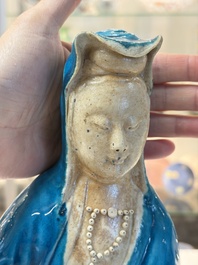 A Chinese turquoise-glazed Guanyin, a white-glazed bottle vase and a blue and white jar, 19th C.