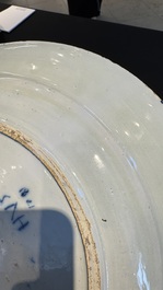 A pair of fine large blue and white Dutch Delft biblical subject dishes, dated 1781