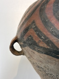 A Chinese painted pottery jar with geometric design, Neolithic period, Majiayao culture, 3rd millennium B.C.