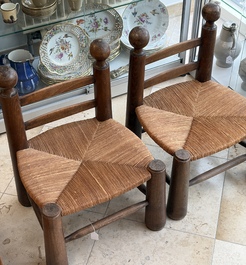 A pair of chairs in oak and straw, attributed to Charles Dudouyt, France, mid 20th C.