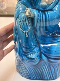 A Chinese turquoise-glazed Guanyin, a white-glazed bottle vase and a blue and white jar, 19th C.