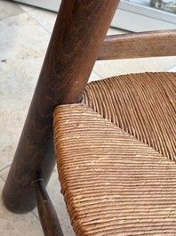 A pair of chairs in oak and straw, attributed to Charles Dudouyt, France, mid 20th C.