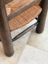 A pair of chairs in oak and straw, attributed to Charles Dudouyt, France, mid 20th C.