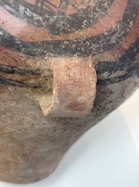 A Chinese painted pottery jar with geometric design, Neolithic period, Majiayao culture, 3rd millennium B.C.