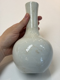 A Chinese turquoise-glazed Guanyin, a white-glazed bottle vase and a blue and white jar, 19th C.